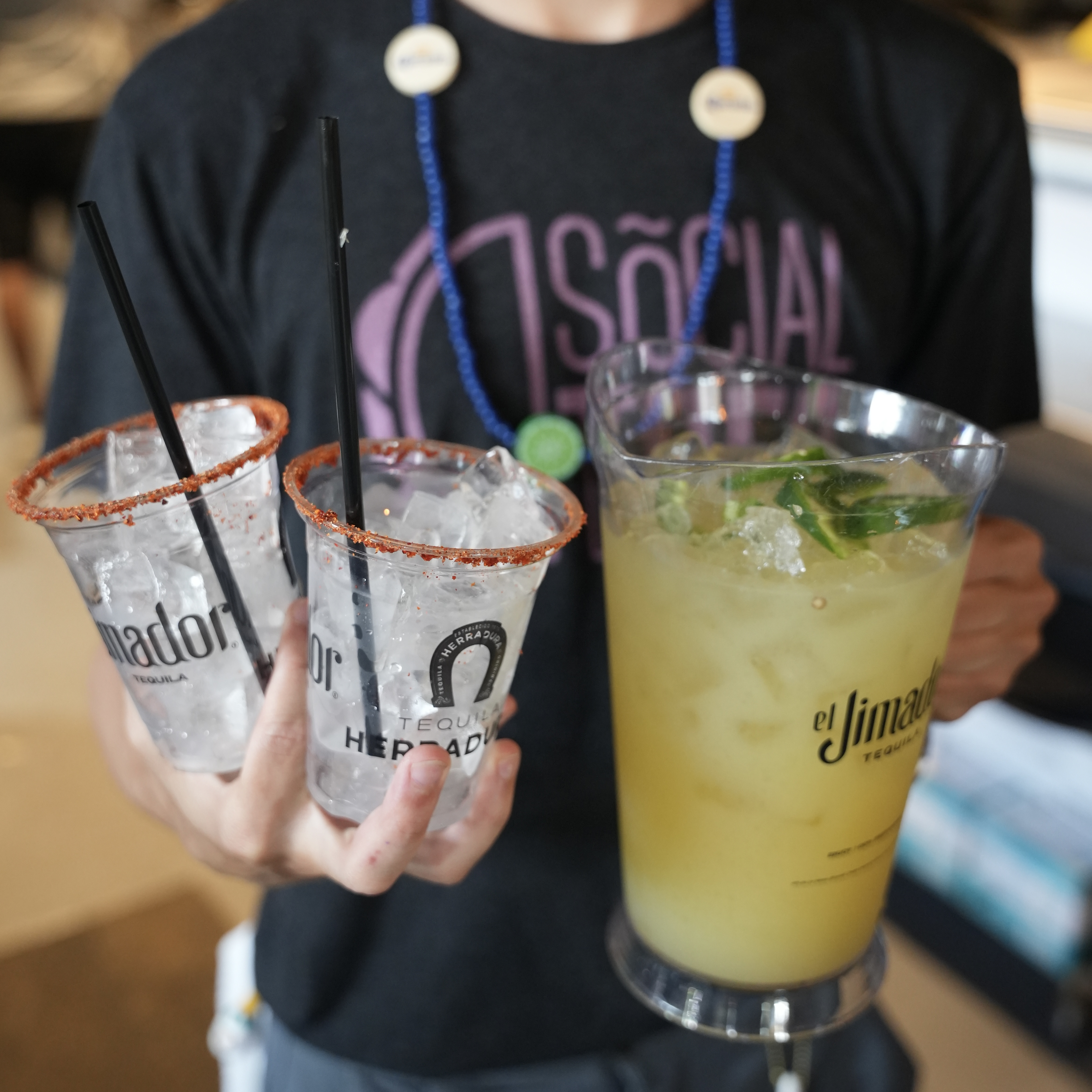 a person drinking from a cup