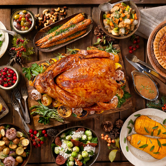 a bunch of different types of food on a table