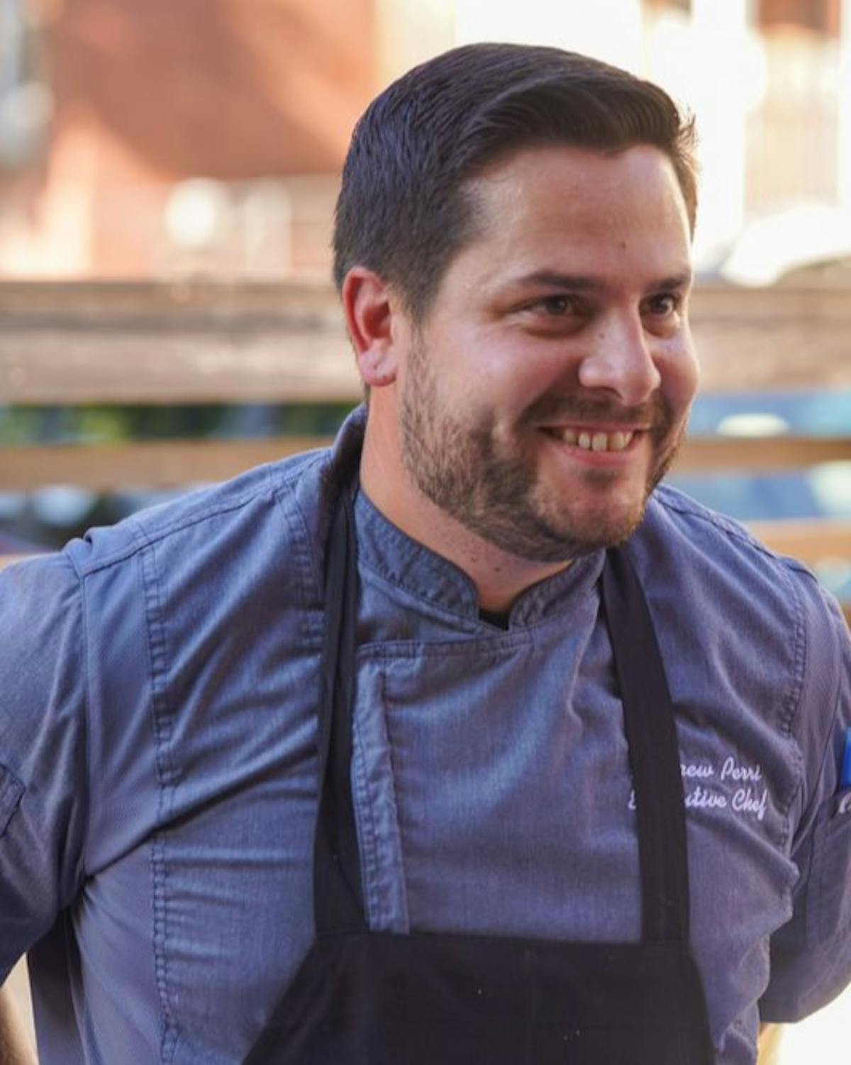 a man in a blue shirt