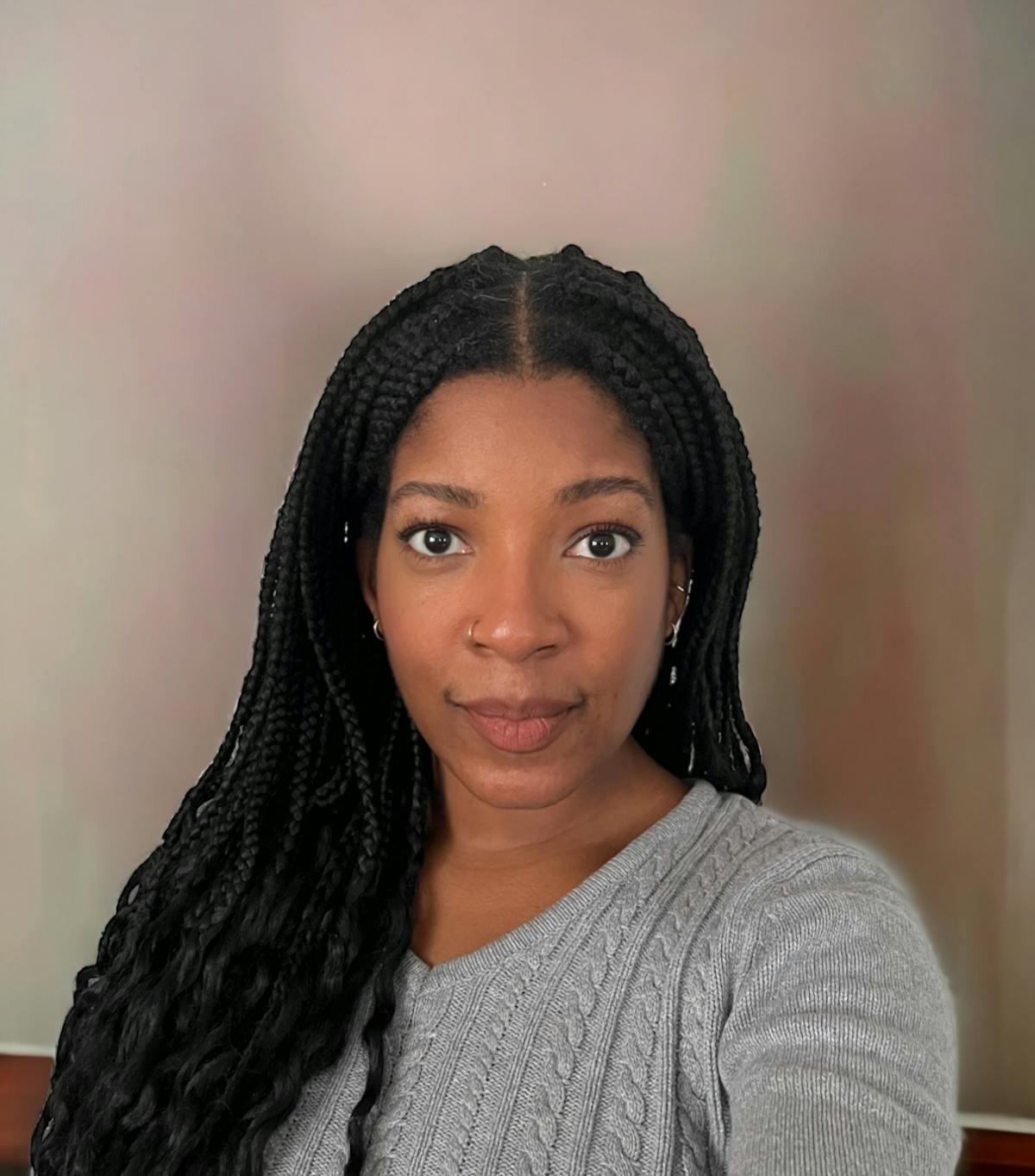 a woman who is smiling and looking at the camera