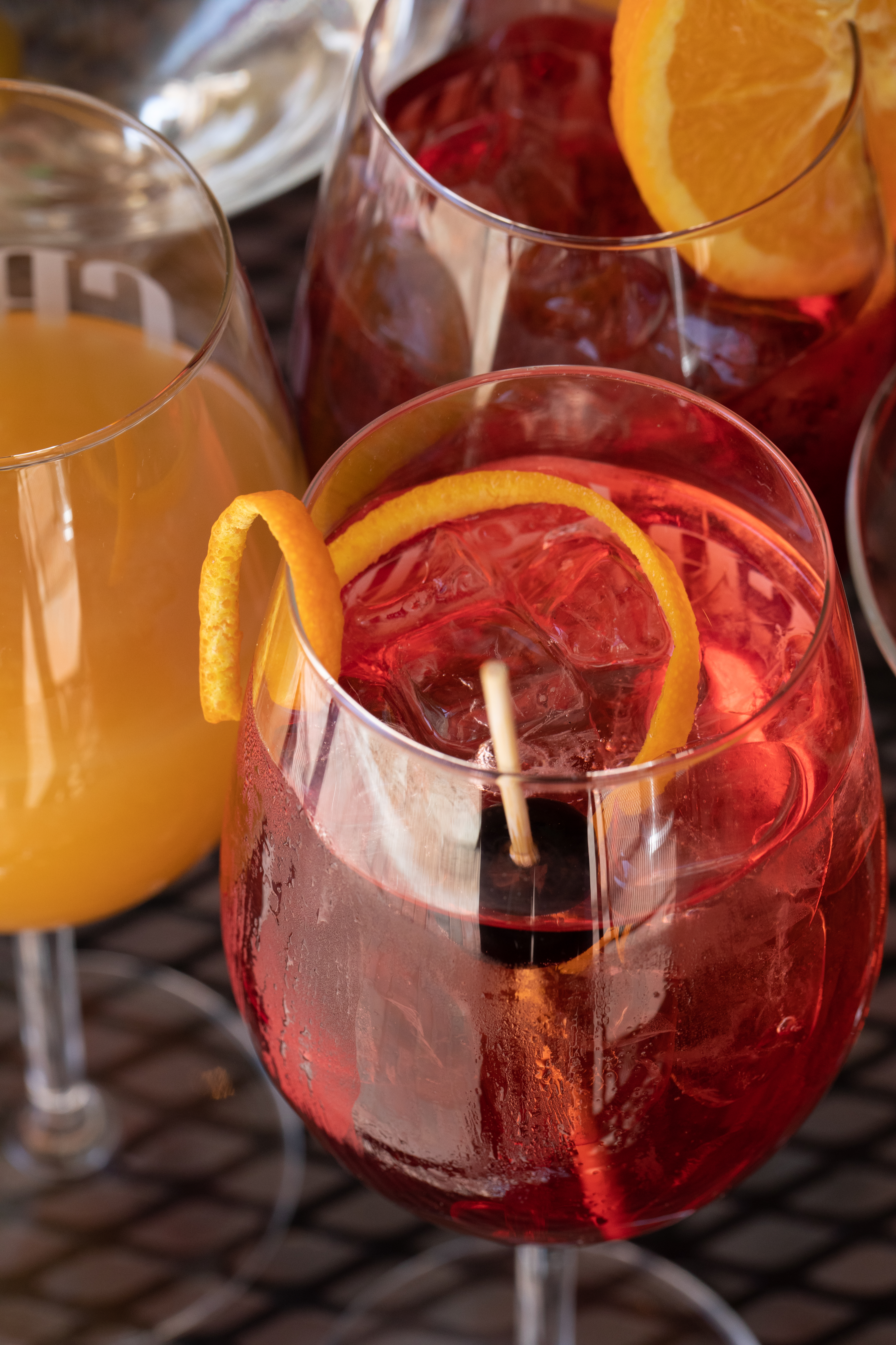 a close up of a glass of orange juice