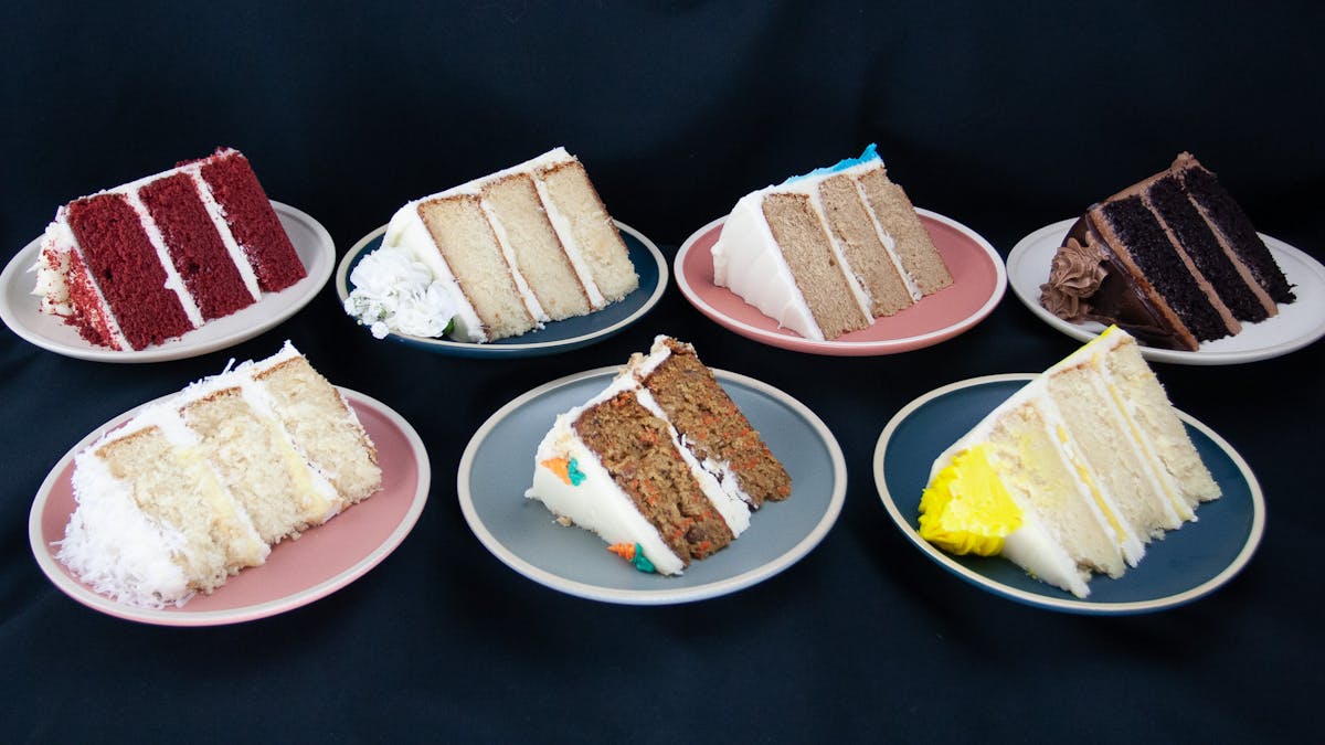 slices of cake on plates, chai tea cake, carrot cake, chocolate cake, wedding cake, coconut cake, lemon cake