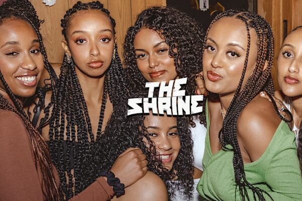 a group of people posing for the camera