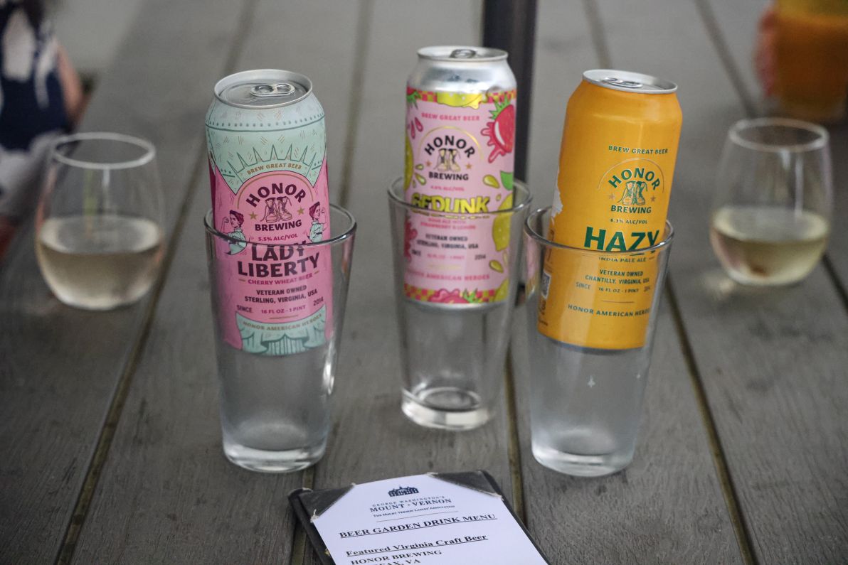 a group of cans and glasses on a table