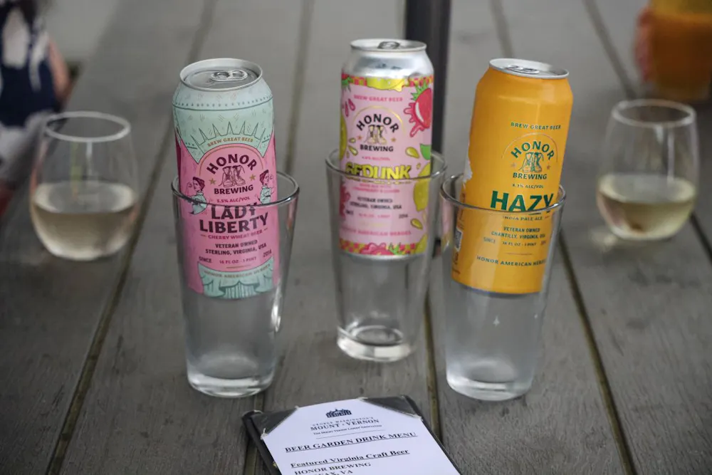 a group of cans and glasses on a table