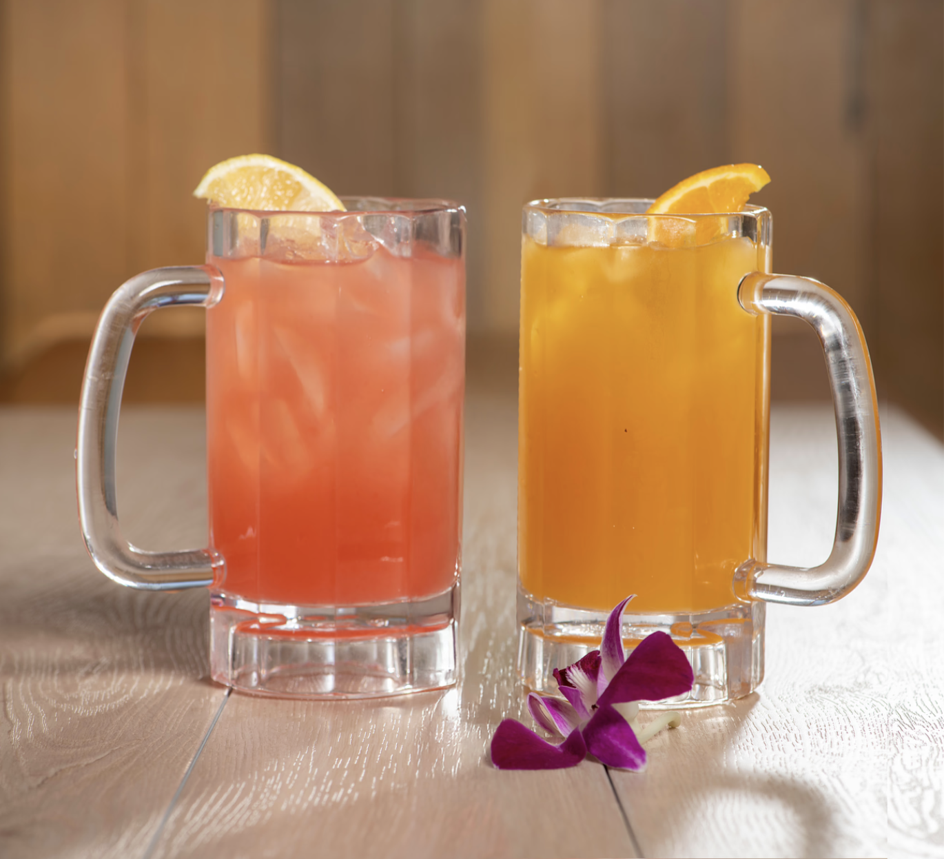 Two Agua Frescas sitting on a table