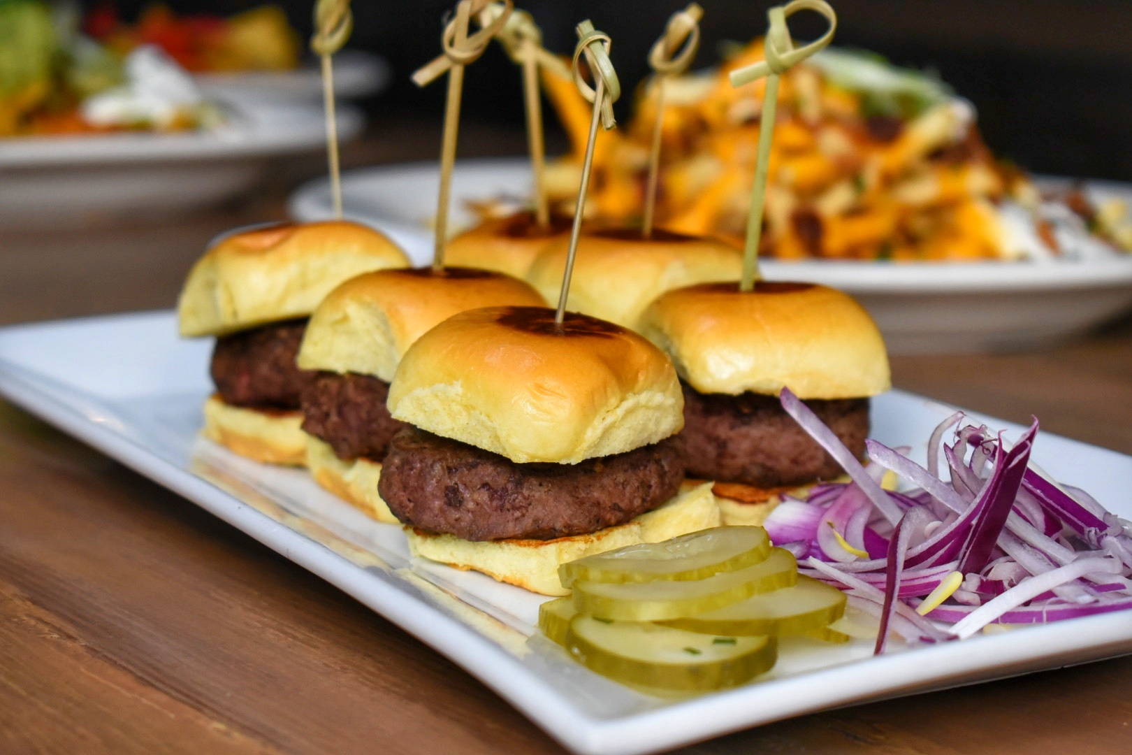 a sandwich sitting on top of a wooden table