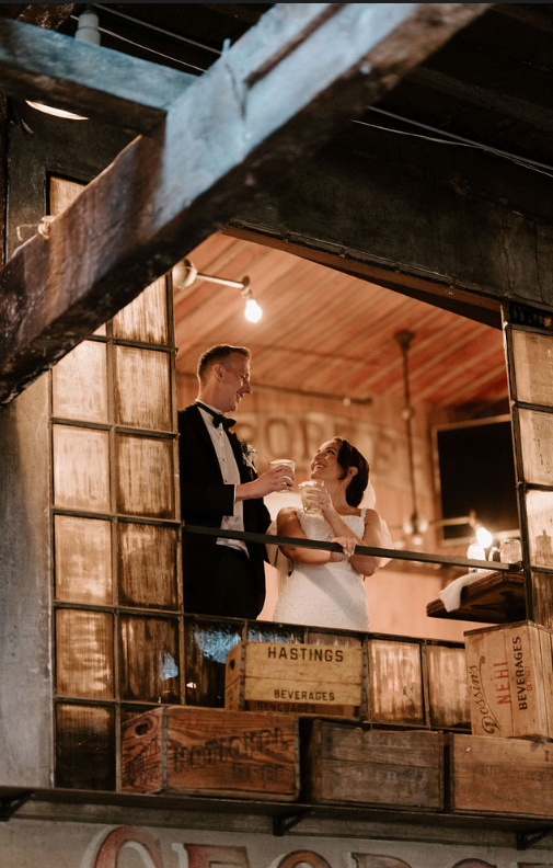 a man and woman standing in a room