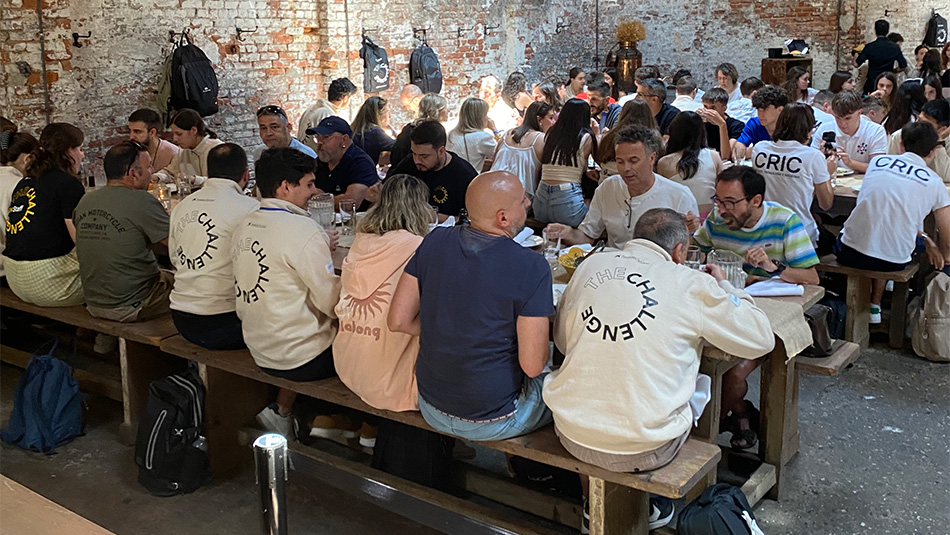People at top dining venue for travel & tour groups in Washington Square Park, New York City.