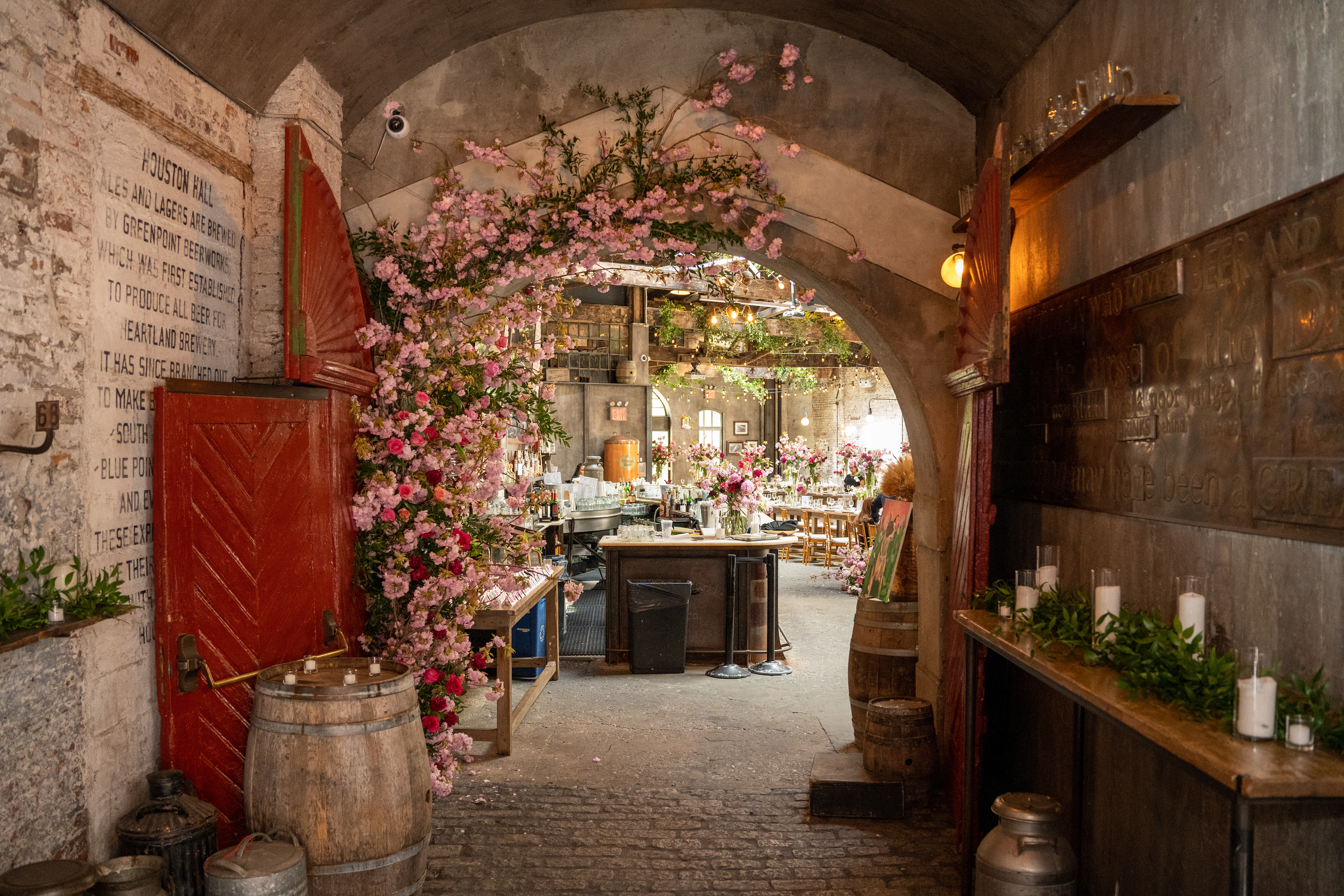 a stone building that has a bunch of furniture in it