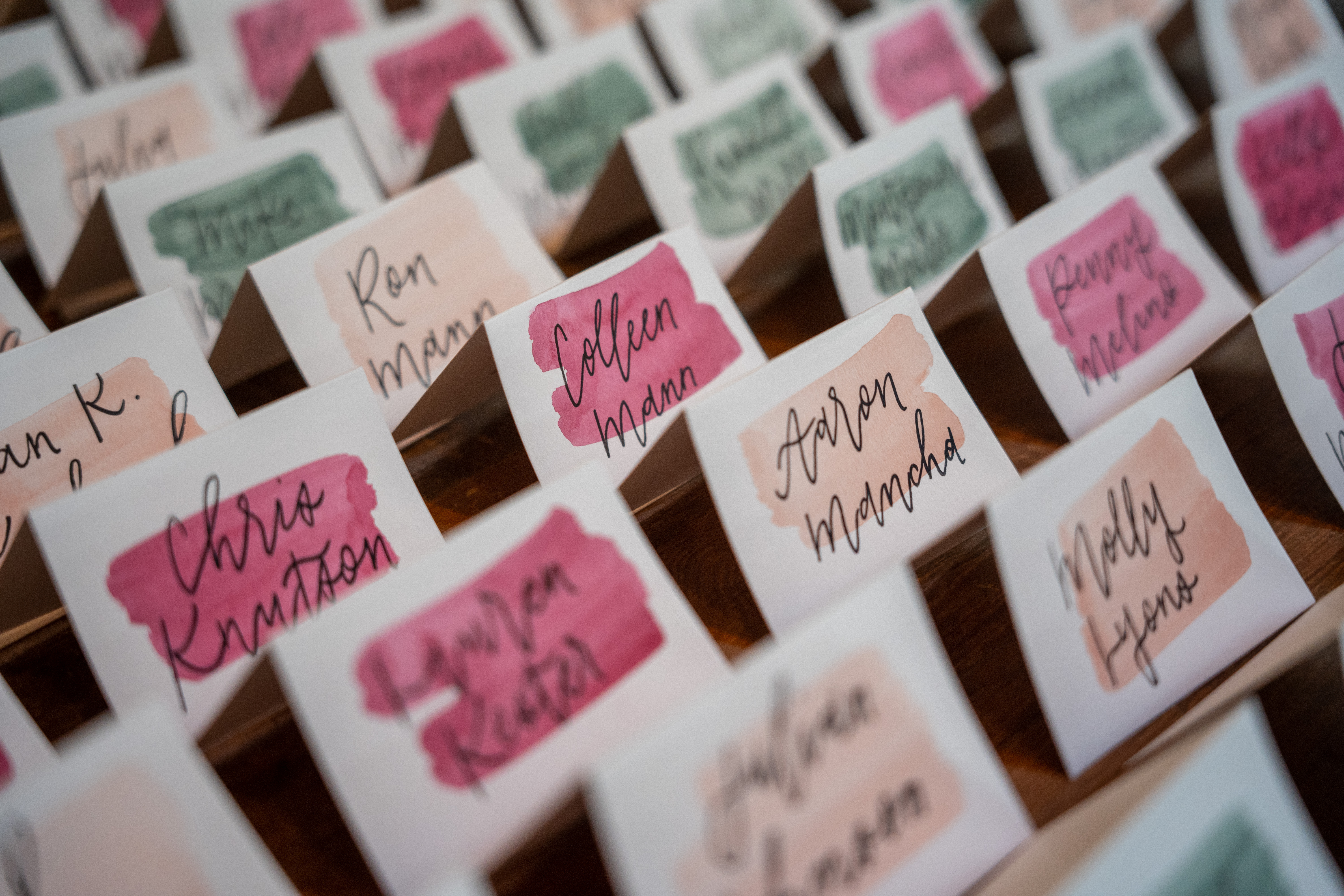 a close up of invitation letters