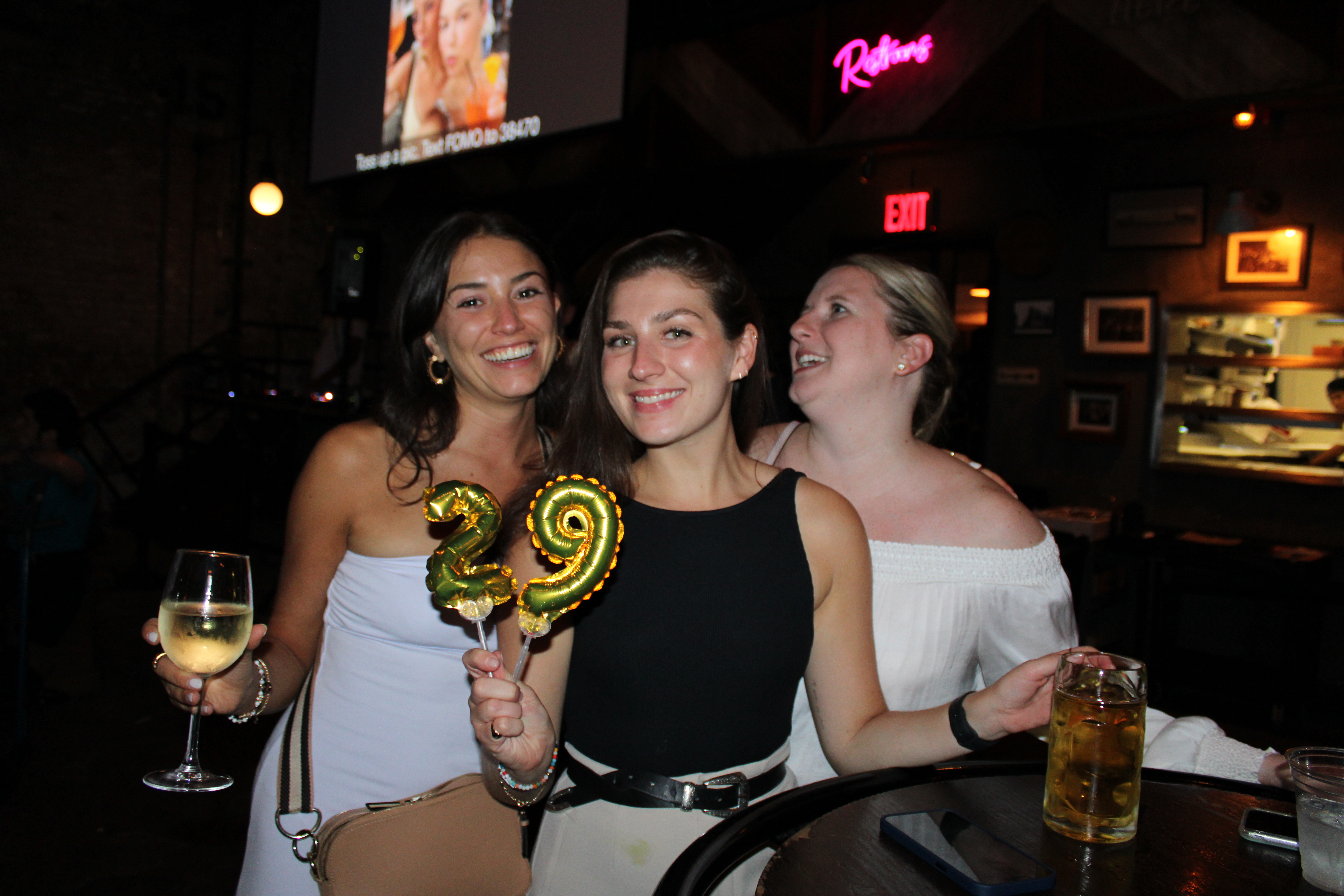 a woman holding a wine glass