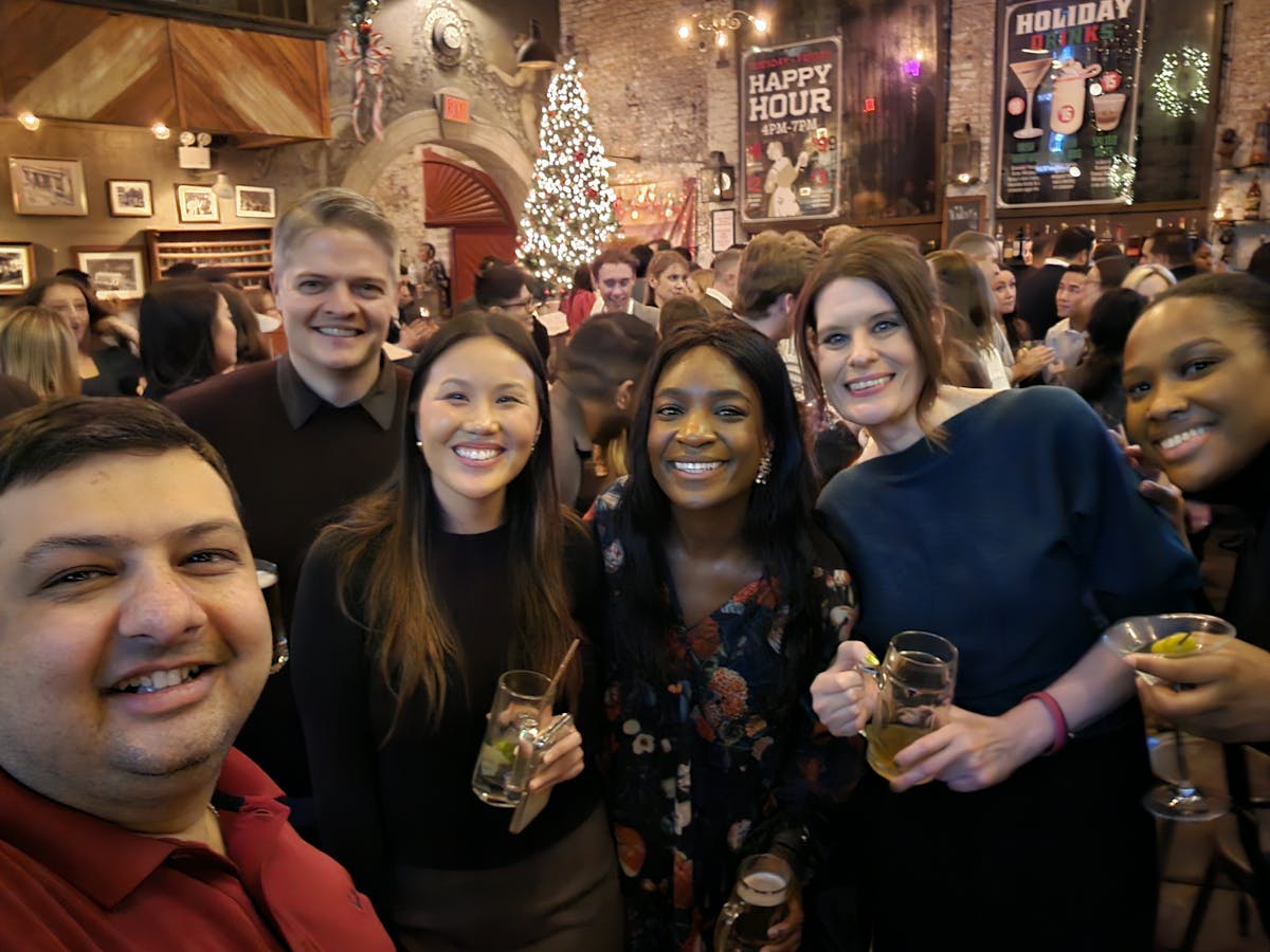 a group of people posing for a photo