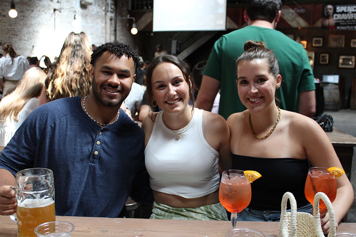a group of people posing for the camera