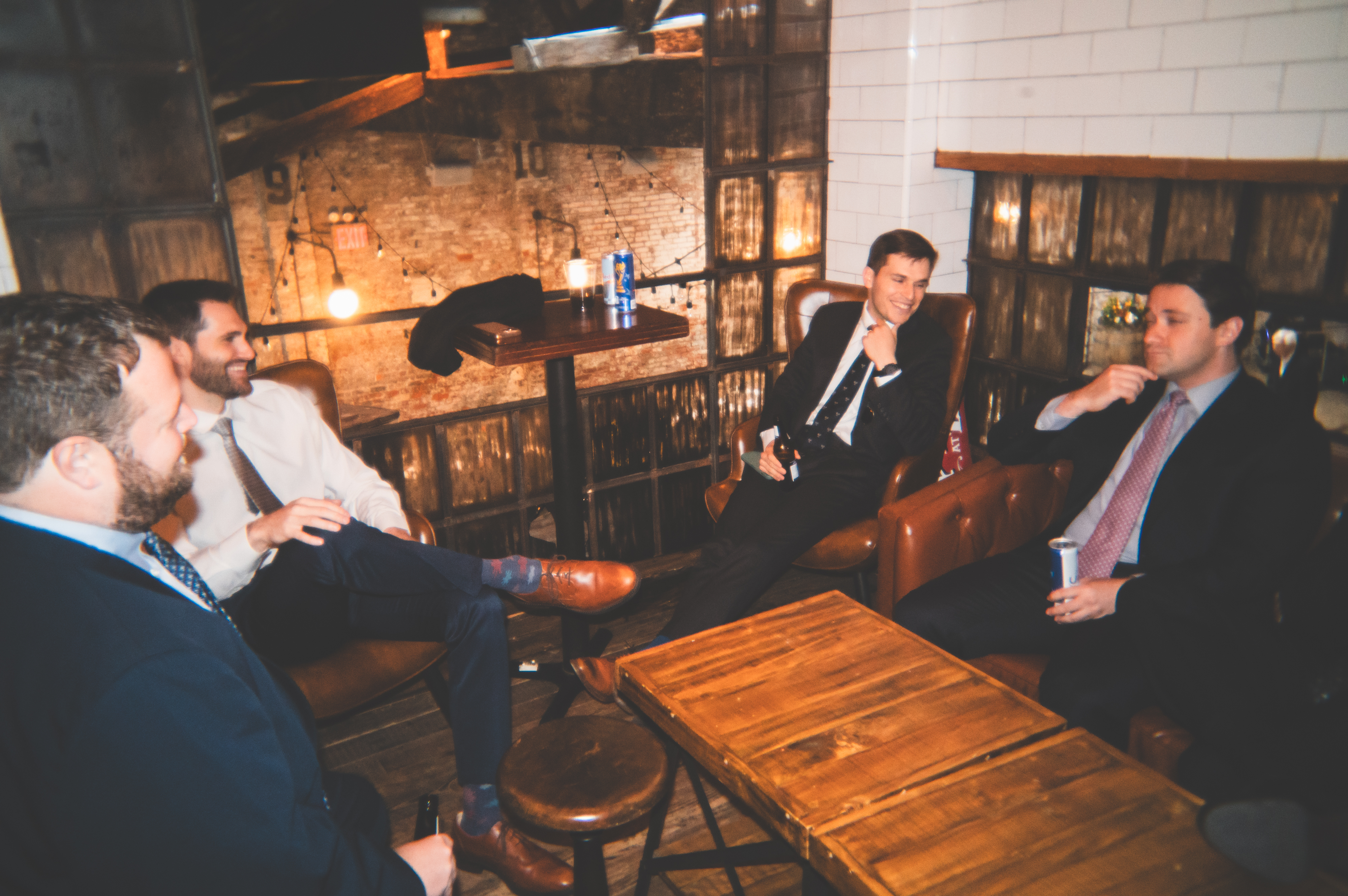 a group of men sitting in chairs
