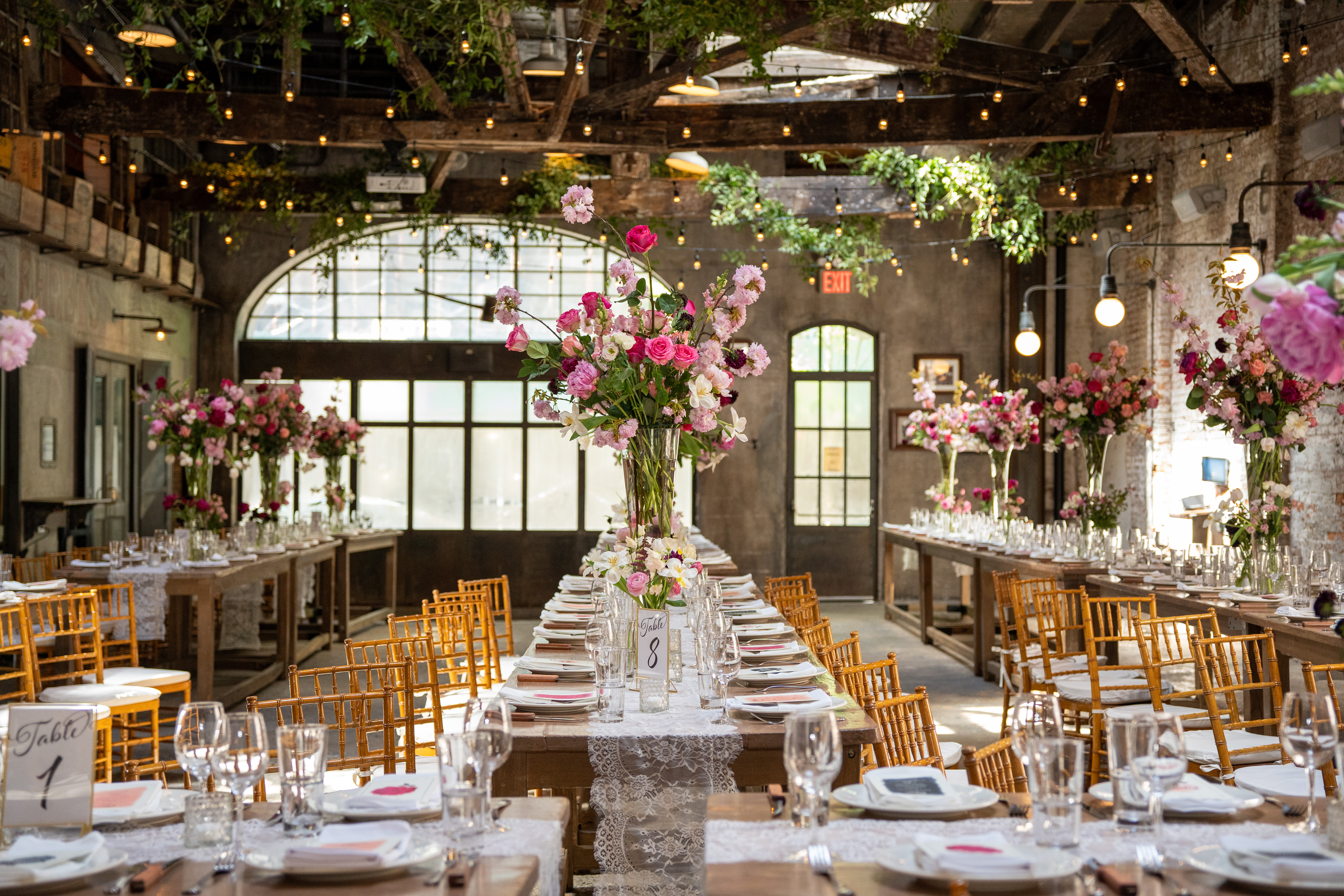 a vase of flowers on a dining table