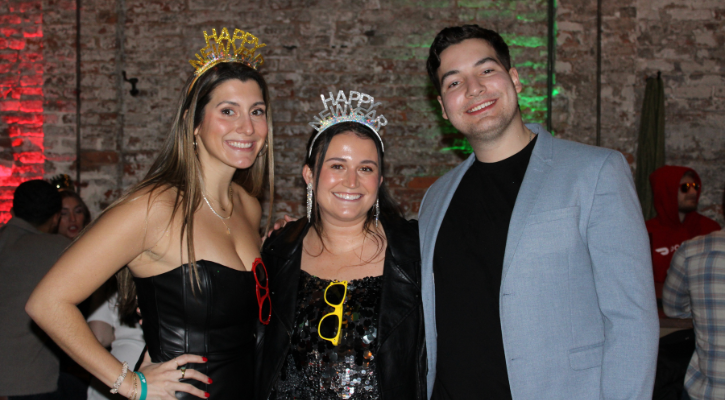 a group of people posing for the camera