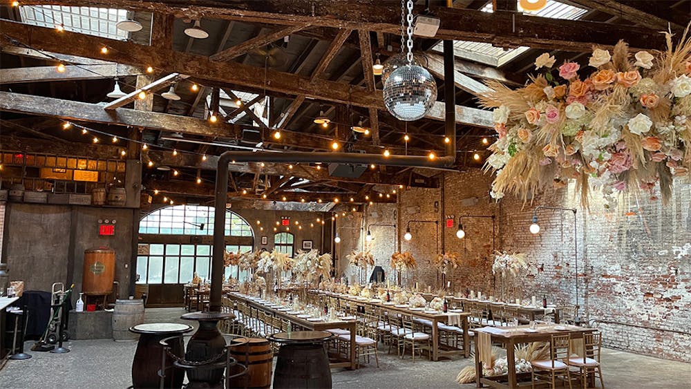 Tables and chairs set up inside our Hudson Square, NYC party place.