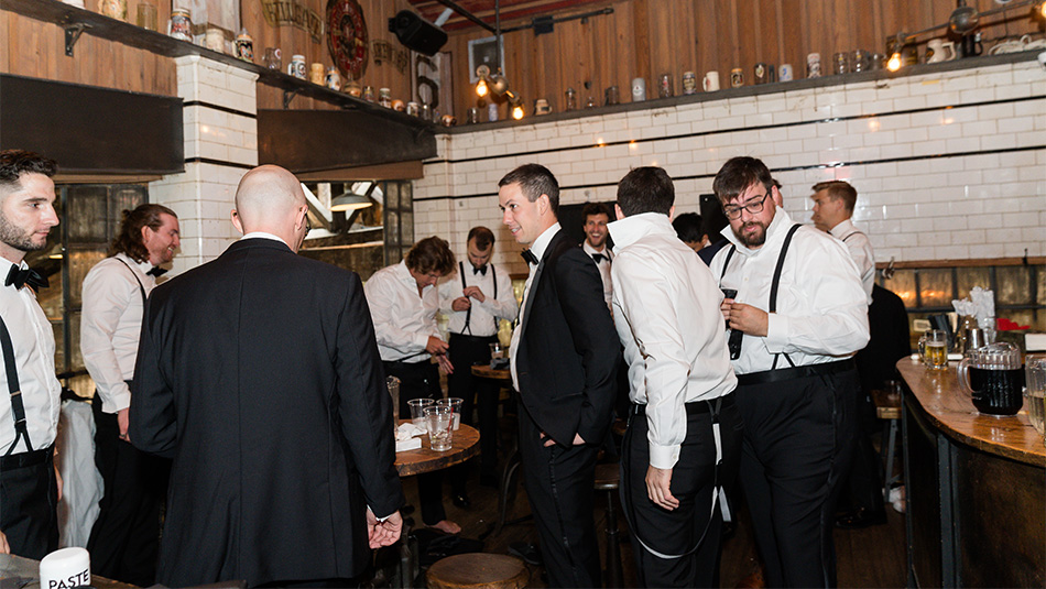 Groomsmen congregating in the VIP Tap Room at our Nolita, NYC wedding venue.