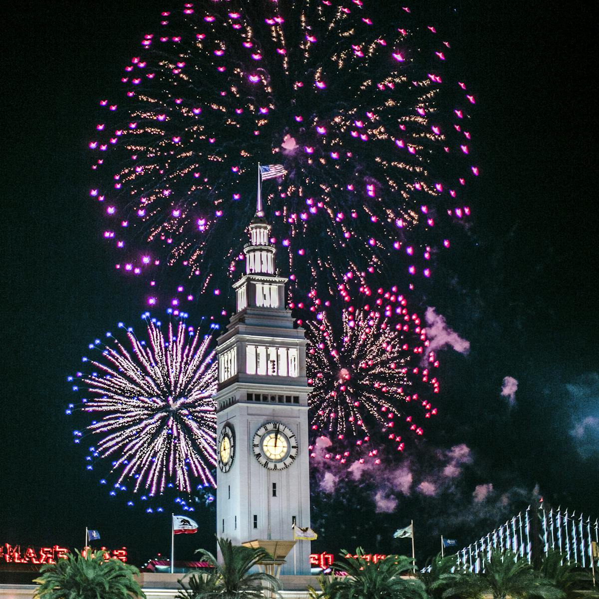 a clock tower lit up at night