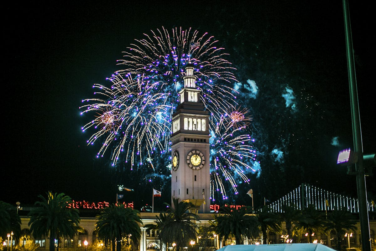 a clock tower lit up at night