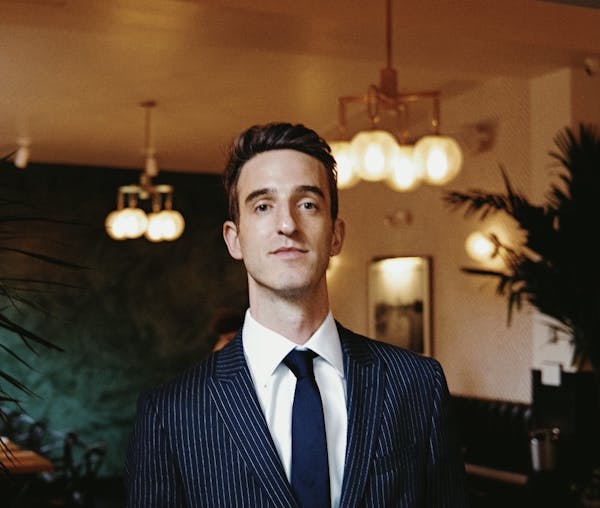 a man wearing a suit and tie