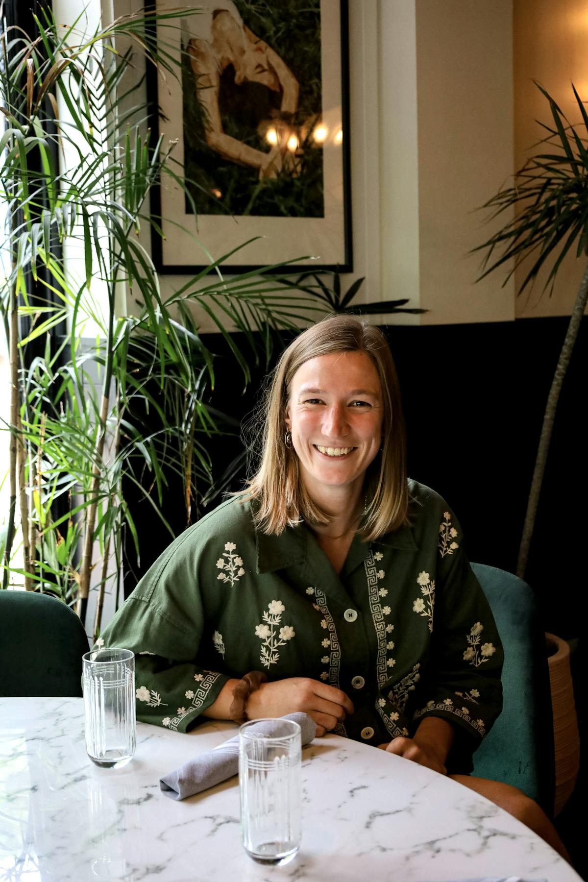 a woman sitting at a table