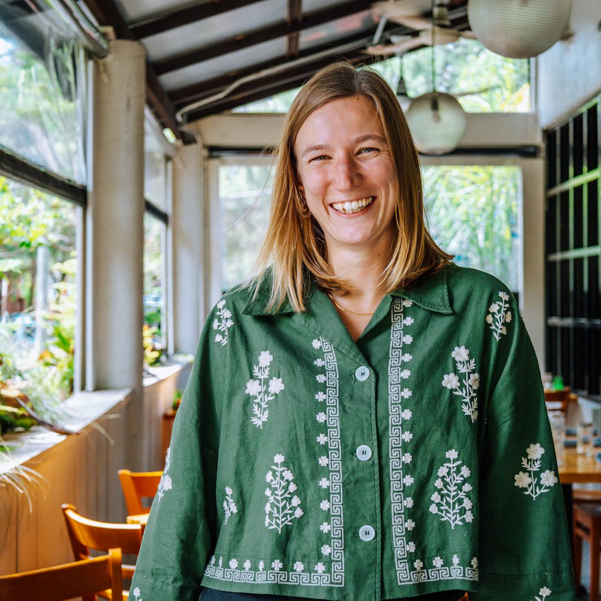 a person in a green shirt