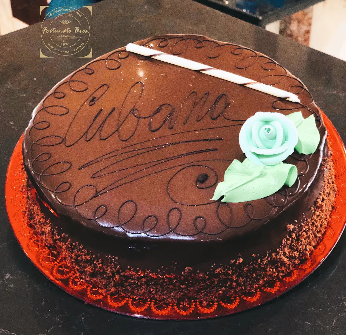 a chocolate cake sitting on top of a table