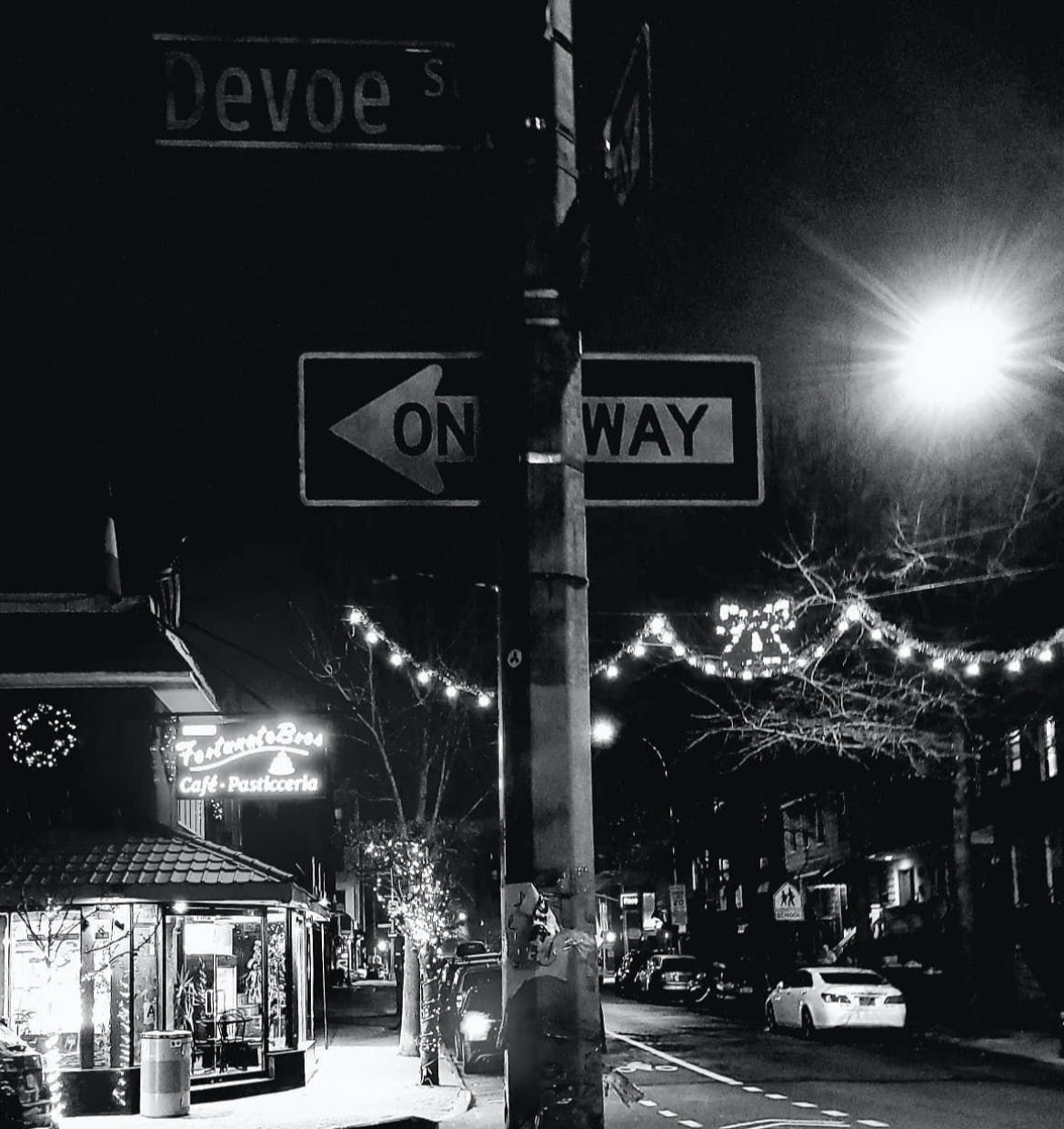 a sign on a city street
