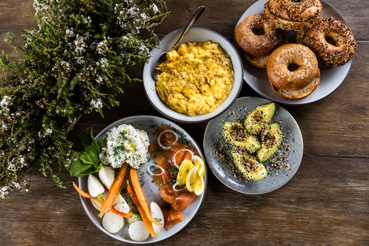 overhead shot of loveski bagels, scrambled eggs, etc.