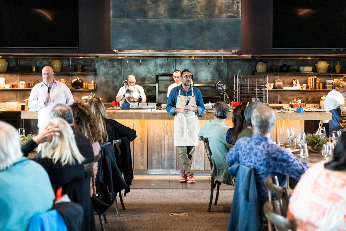 chef kostow addressing the room in the ojai farmhouse
