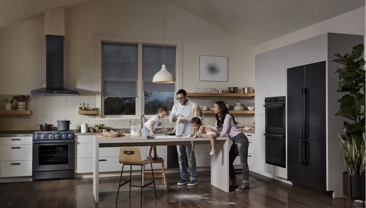 a person standing in a kitchen