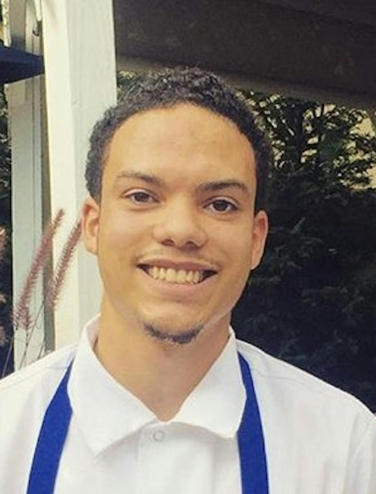 a man smiling for the camera