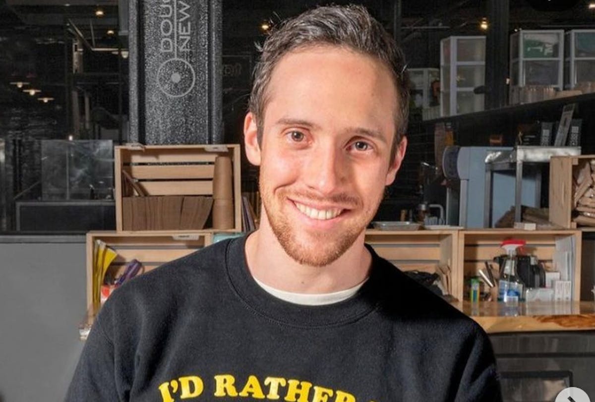 a man smiling for the camera