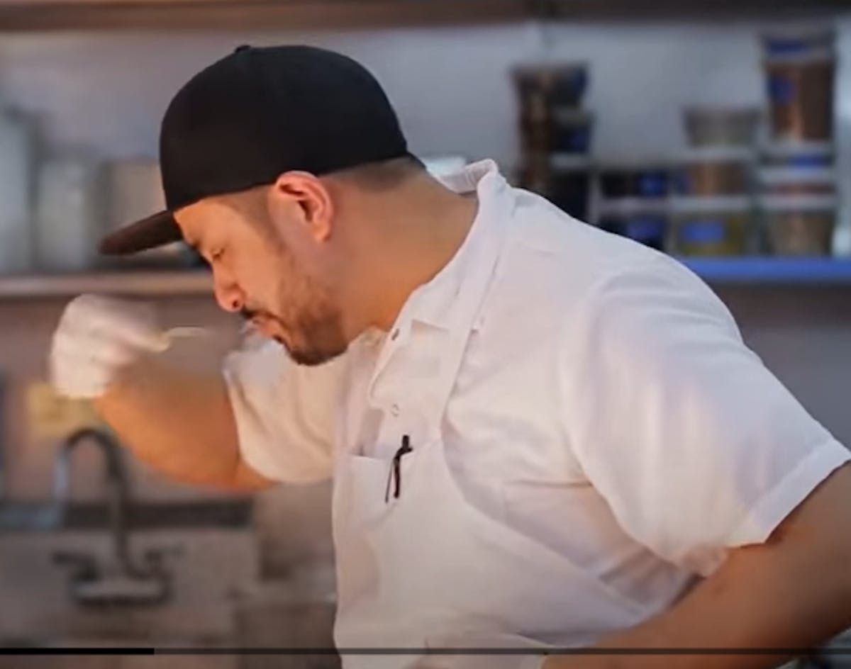 a man in a kitchen
