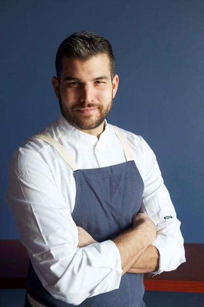 Rodrigo Quirarte in a blue shirt