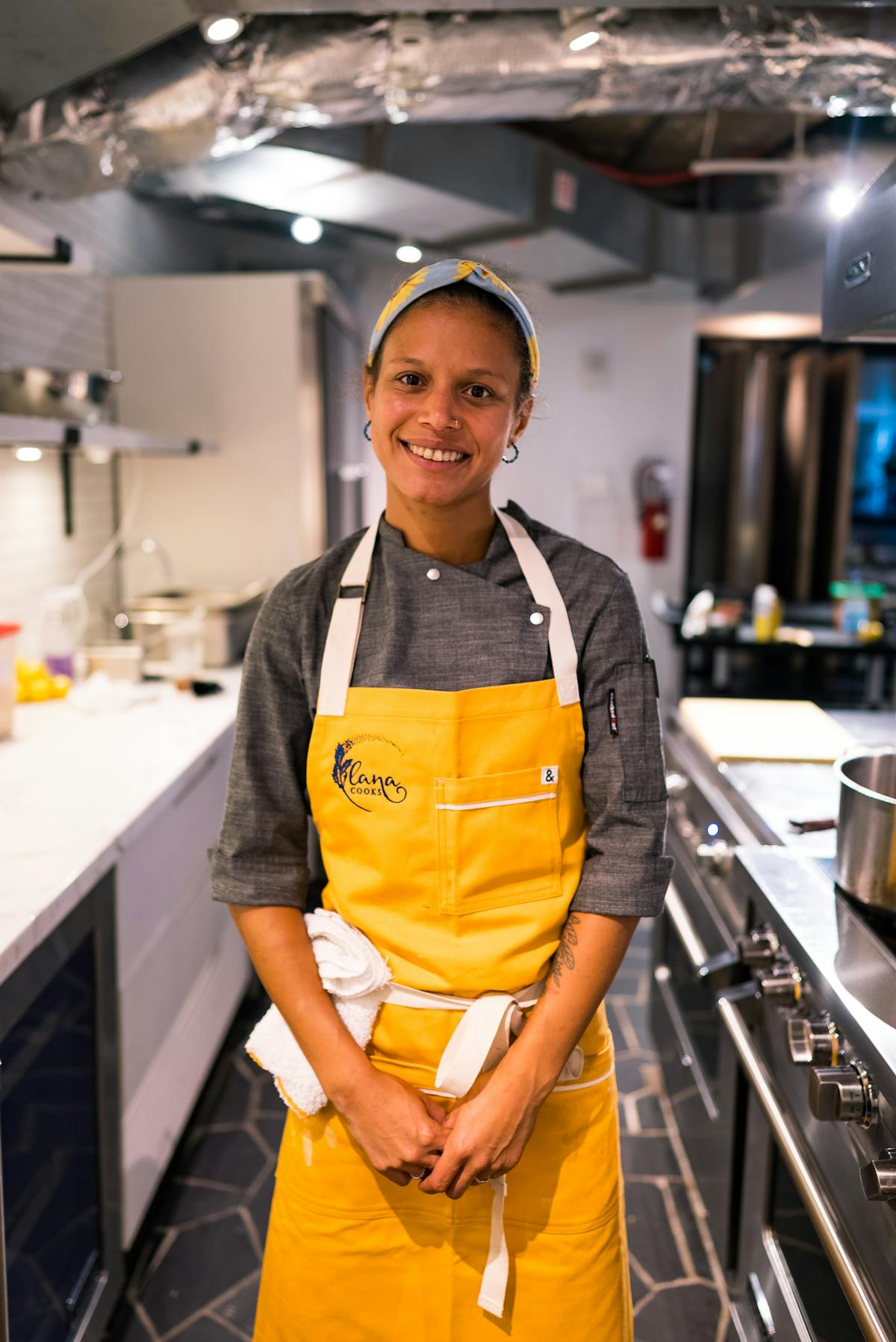 a person cooking in a kitchen preparing food