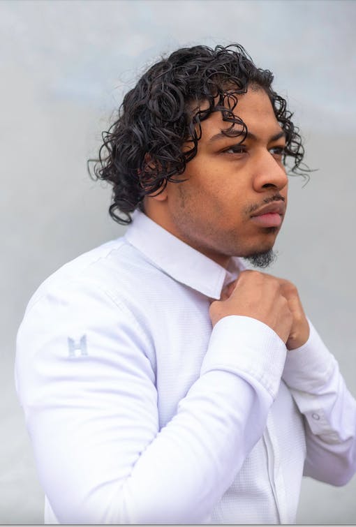 a person wearing a dress shirt and tie