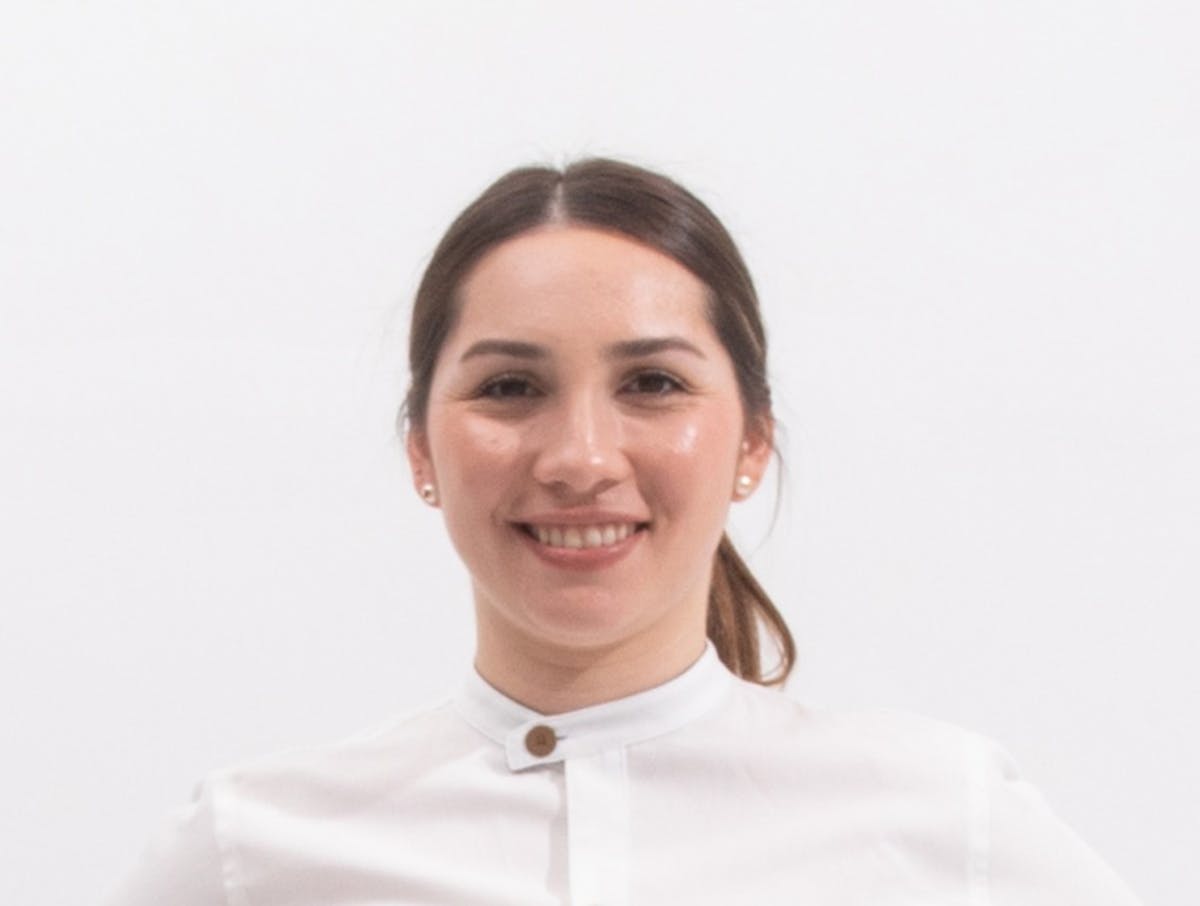 a woman smiling for the camera