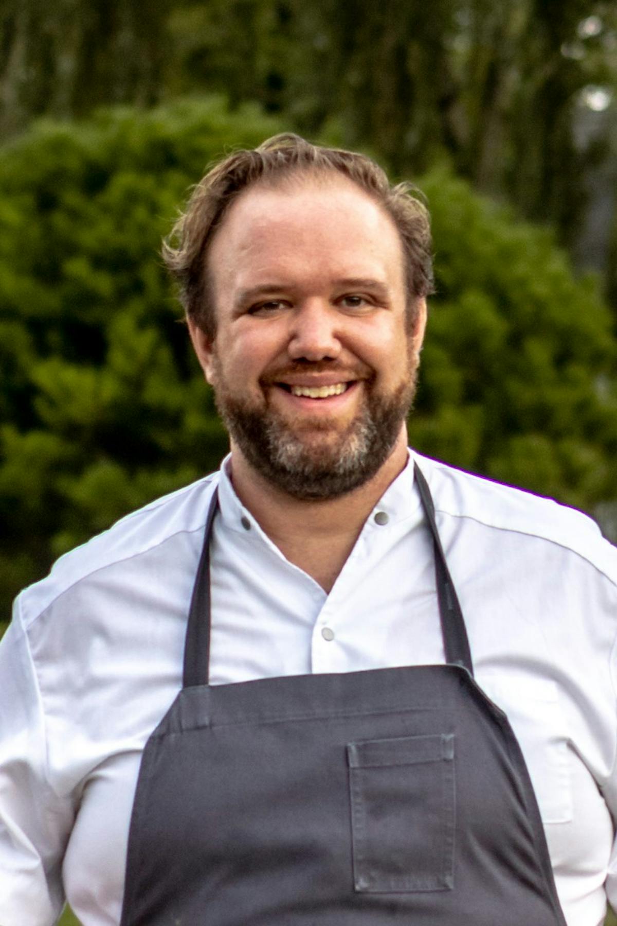 a man smiling for the camera