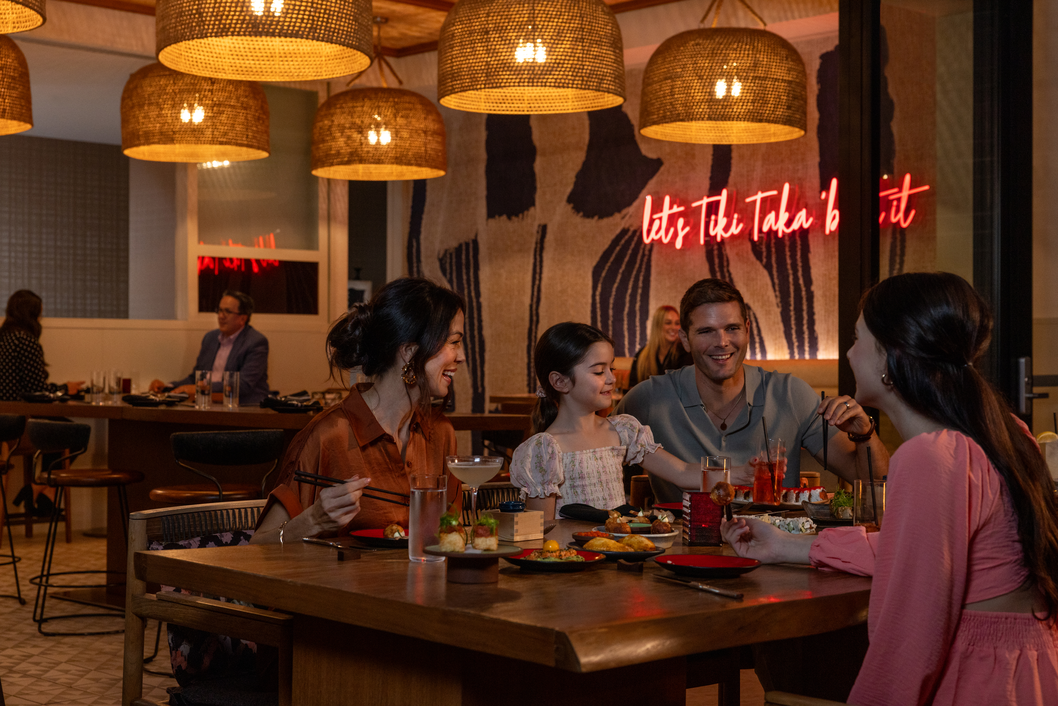 a plate of food sitting on top of a wooden table
