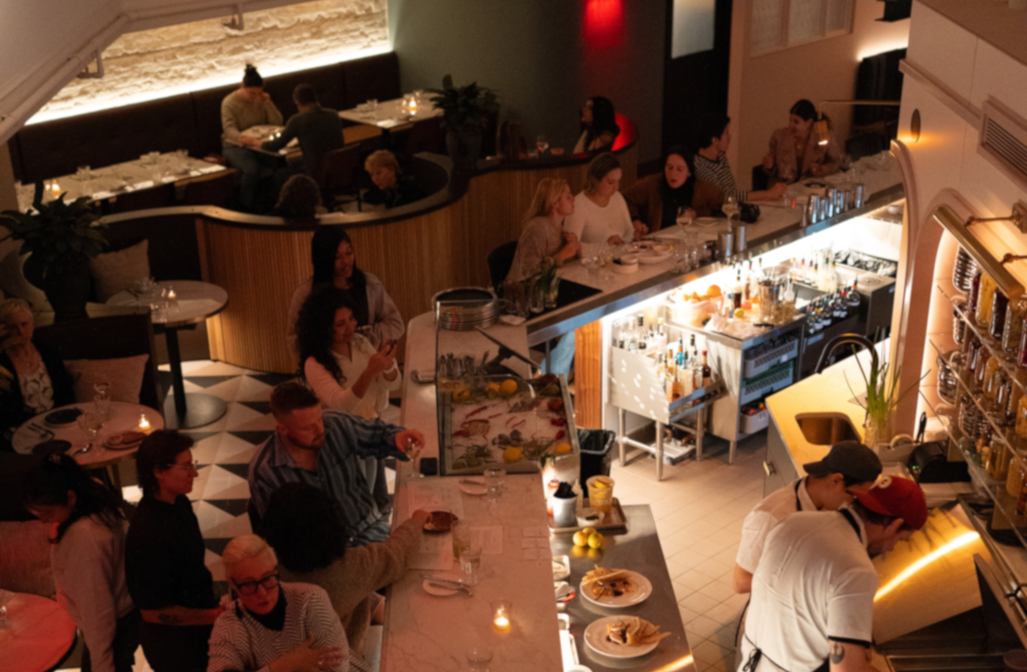 a group of people sitting at a table in a room
