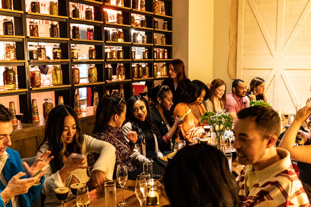 a group of people sitting at a table