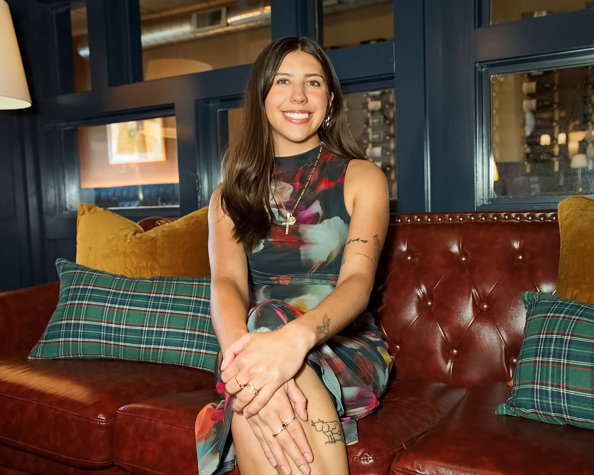 a woman sitting on a couch