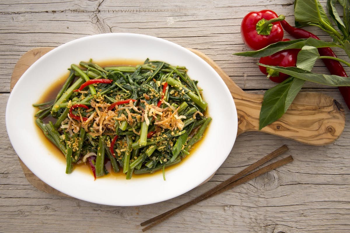 a bowl of salad on a plate