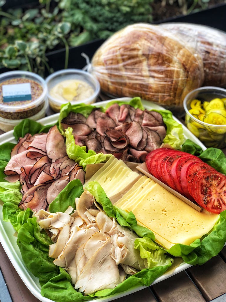 a plate of food with a sandwich and a salad