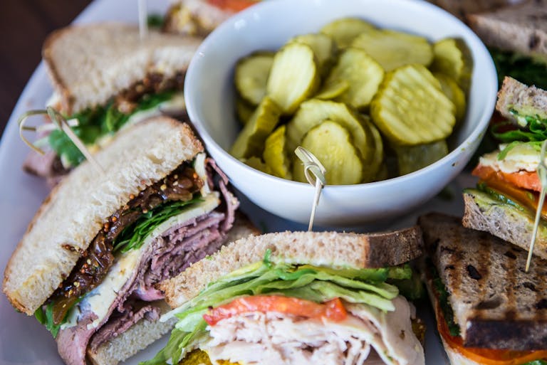 a sandwich cut in half on a plate