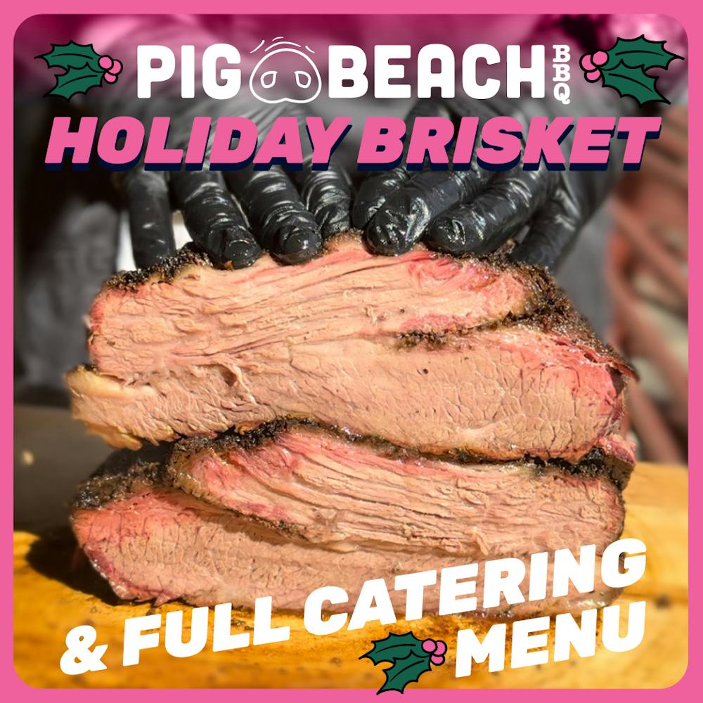 a large chocolate cake sitting on top of a book