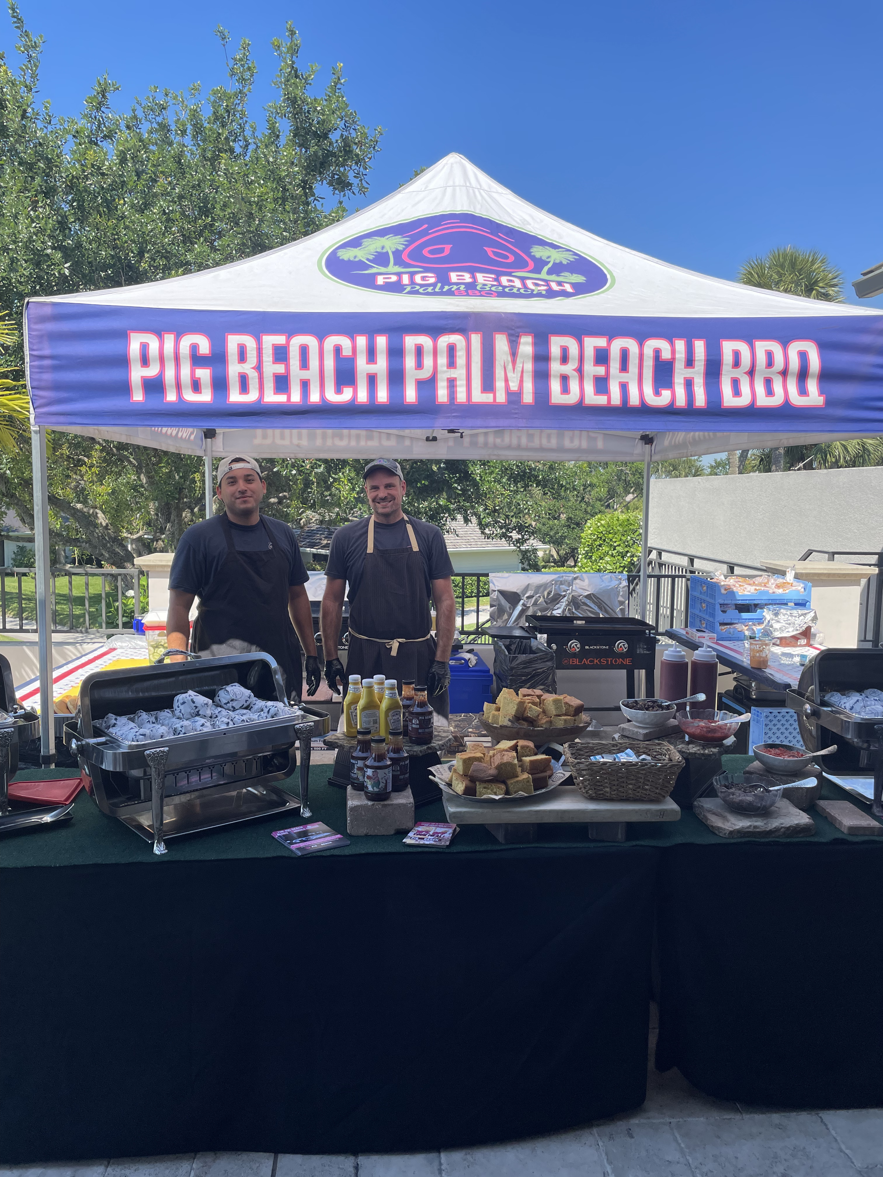 a stand with several trays of food